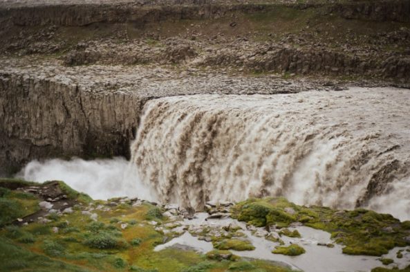 The lip of Dettifoss close up, showing how much glacial silt the water carries